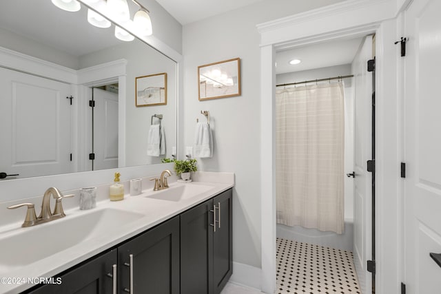 bathroom with shower / tub combo and vanity