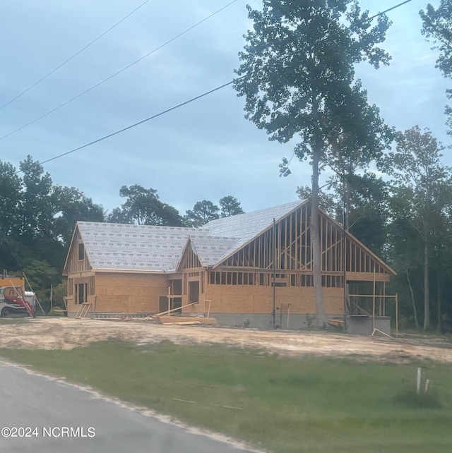 view of front of home with an outbuilding