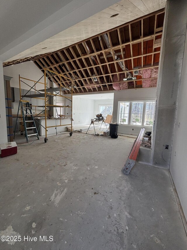 unfurnished living room featuring wooden ceiling