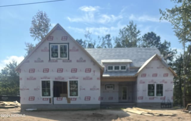 property under construction with a porch