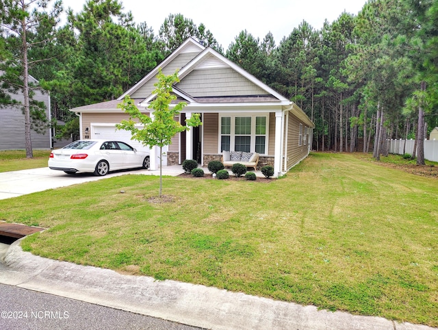 view of front of home with a front yard and a porch