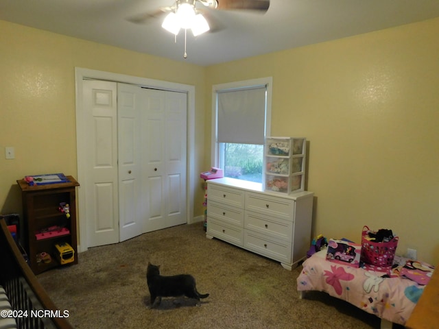 bedroom featuring ceiling fan, carpet floors, and a closet