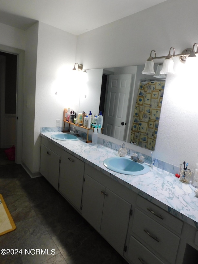 bathroom featuring vanity and tile patterned floors