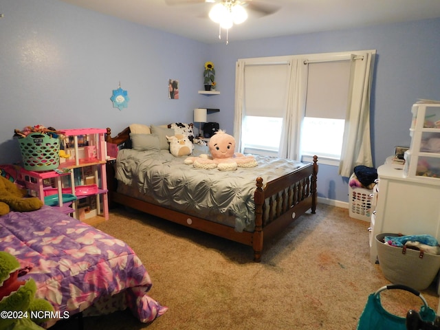 carpeted bedroom with ceiling fan