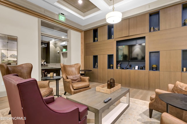 living room featuring beamed ceiling, light hardwood / wood-style floors, crown molding, and coffered ceiling