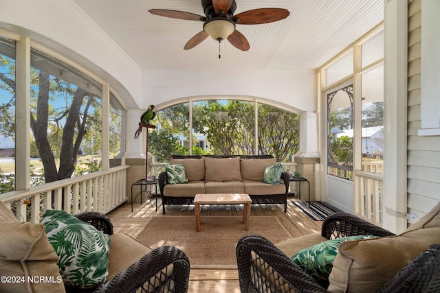 sunroom / solarium with ceiling fan