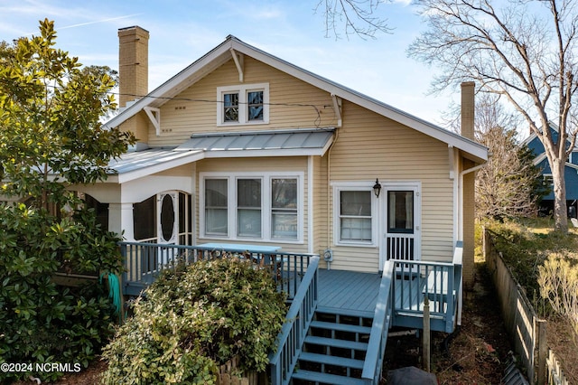 view of front of home with a deck