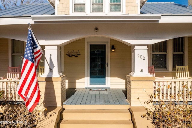 entrance to property with covered porch