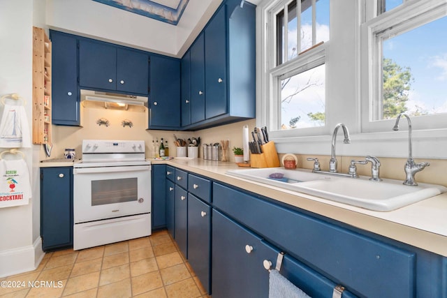 kitchen with blue cabinets, electric range, light tile patterned floors, and sink