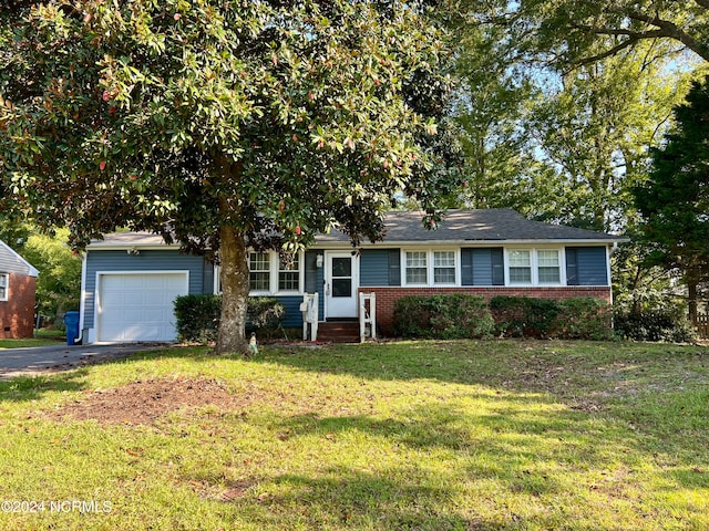 single story home with a front lawn and a garage