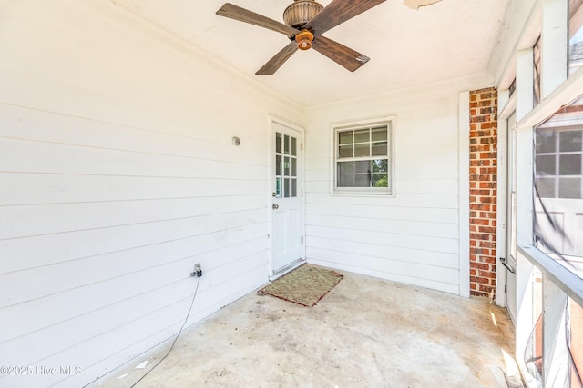 doorway to property featuring a lawn