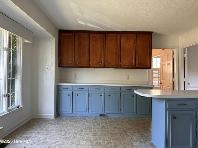 kitchen with a textured ceiling