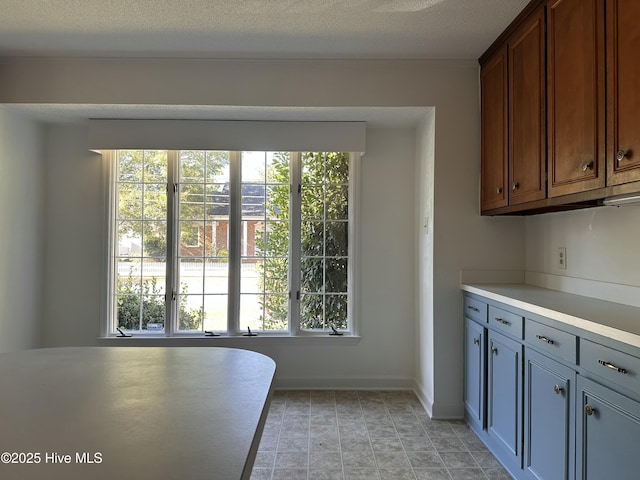 kitchen with a textured ceiling