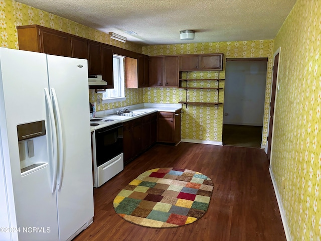 kitchen with white appliances, sink, dark hardwood / wood-style floors, dark brown cabinetry, and a textured ceiling