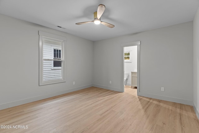 unfurnished room with ceiling fan and light hardwood / wood-style floors