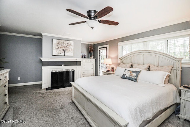 bedroom with ceiling fan, crown molding, and dark carpet