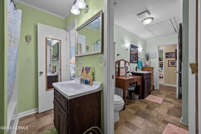 full bathroom featuring vanity, crown molding, toilet, and shower / bath combo