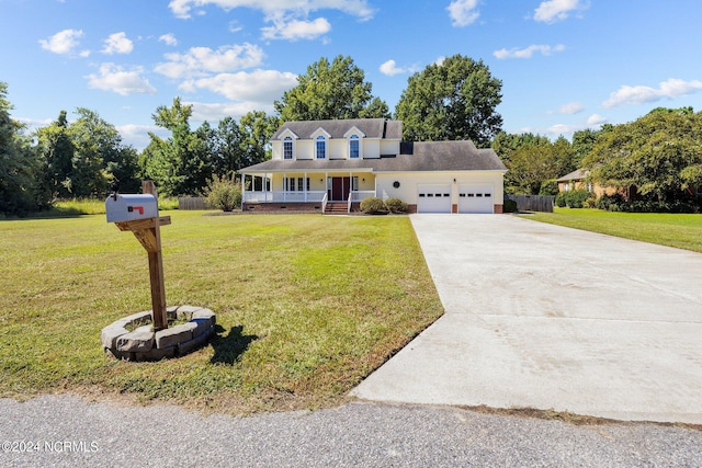 view of front facade featuring a garage, a front lawn, and a porch