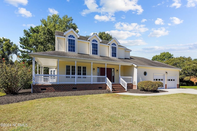 farmhouse with a garage, a front lawn, and covered porch