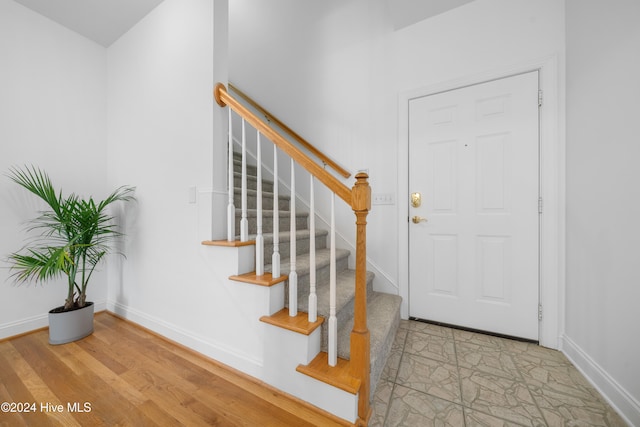 foyer with light hardwood / wood-style floors