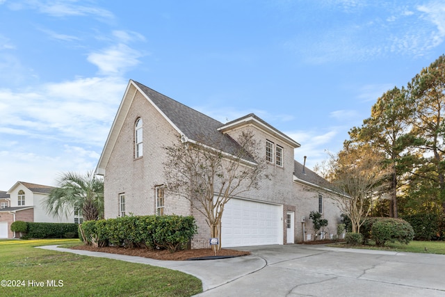 front of property with a garage