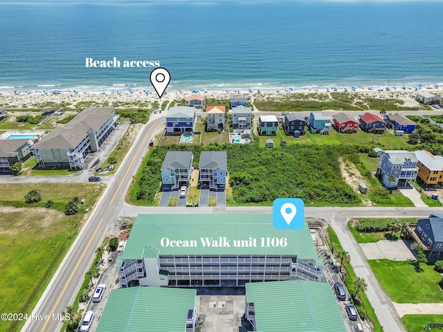 drone / aerial view with a view of the beach and a water view