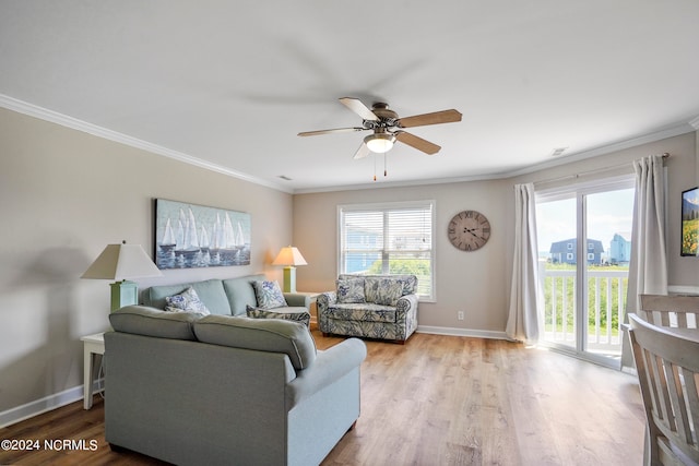 living room with ceiling fan, light hardwood / wood-style floors, and ornamental molding