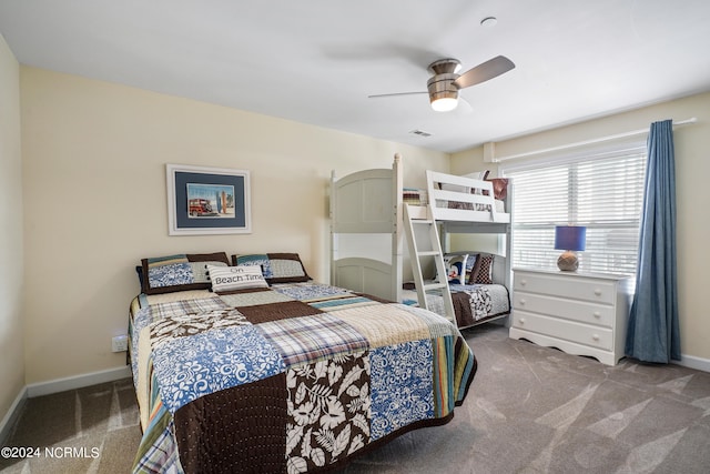 bedroom with ceiling fan and carpet floors