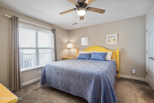 carpeted bedroom with ceiling fan