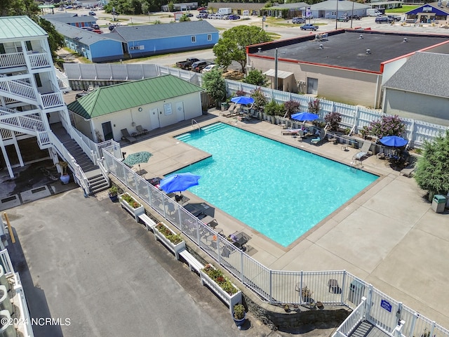 view of pool featuring a patio area