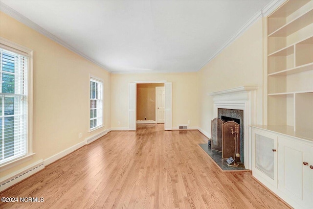 unfurnished living room featuring a baseboard radiator, crown molding, light hardwood / wood-style floors, and a high end fireplace