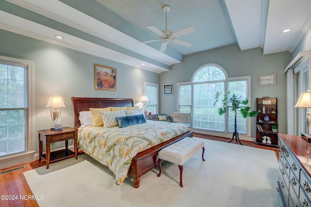 bedroom featuring lofted ceiling, ceiling fan, and light hardwood / wood-style flooring