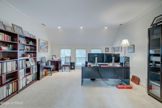 carpeted office with ornamental molding and vaulted ceiling