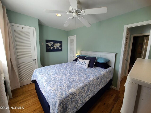 bedroom featuring hardwood / wood-style flooring and ceiling fan