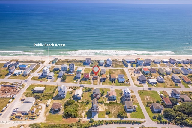 2712 Island Dr, North Topsail Beach, NC 28460 - bird's eye view featuring a view of the beach, a residential view, and a water view