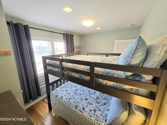 2712 Island Dr, North Topsail Beach, NC 28460 - bedroom with recessed lighting and wood finished floors