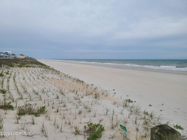 property view of water featuring a view of the beach