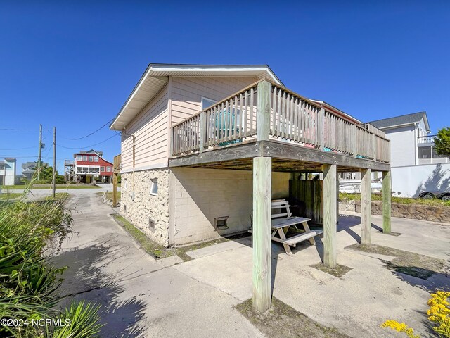 view of home's exterior featuring a deck