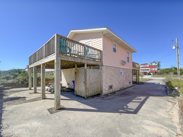2712 Island Dr, North Topsail Beach, NC 28460 - view of property exterior with a patio area and a deck