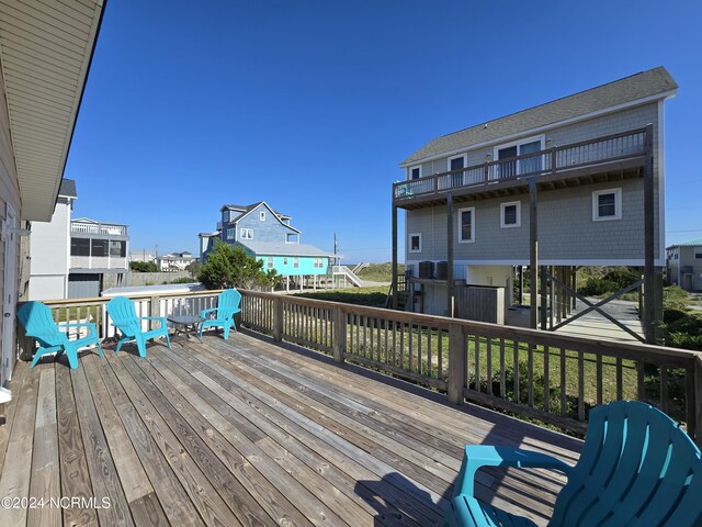 deck featuring a lawn