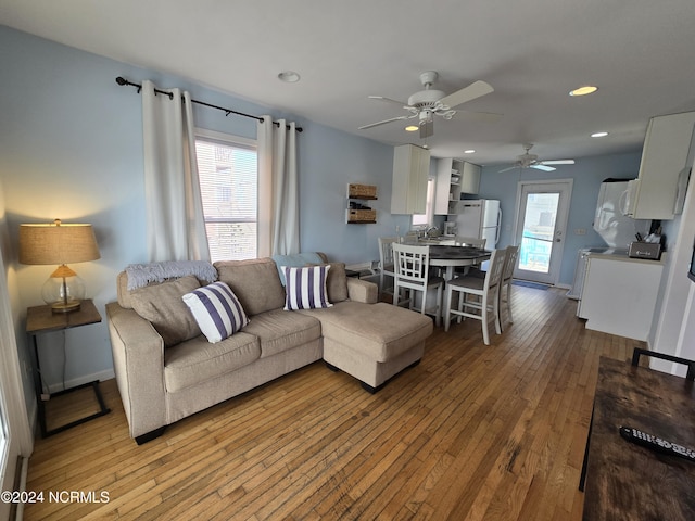 2712 Island Dr, North Topsail Beach, NC 28460 - living area with recessed lighting, a ceiling fan, hardwood / wood-style flooring, and baseboards
