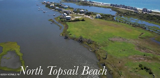 2712 Island Dr, North Topsail Beach, NC 28460 - birds eye view of property featuring a water view
