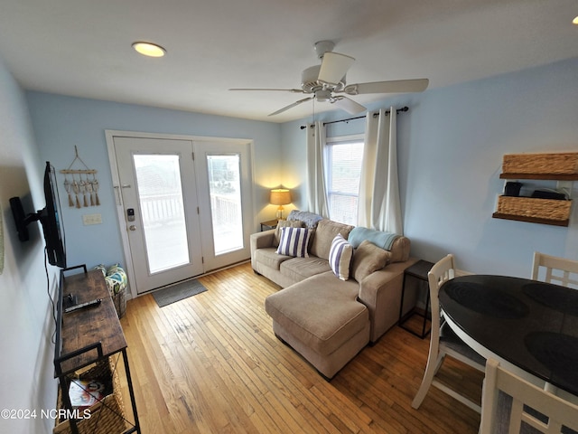 2712 Island Dr, North Topsail Beach, NC 28460 - living room with light wood-style floors, a ceiling fan, and recessed lighting