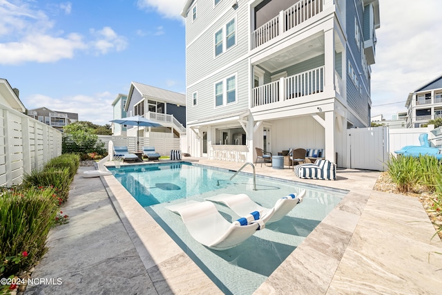 view of pool featuring a patio area