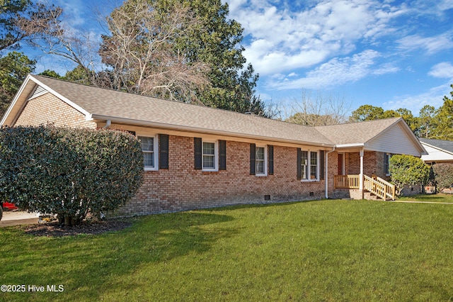 ranch-style home with a front lawn