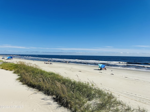 property view of water featuring a view of the beach