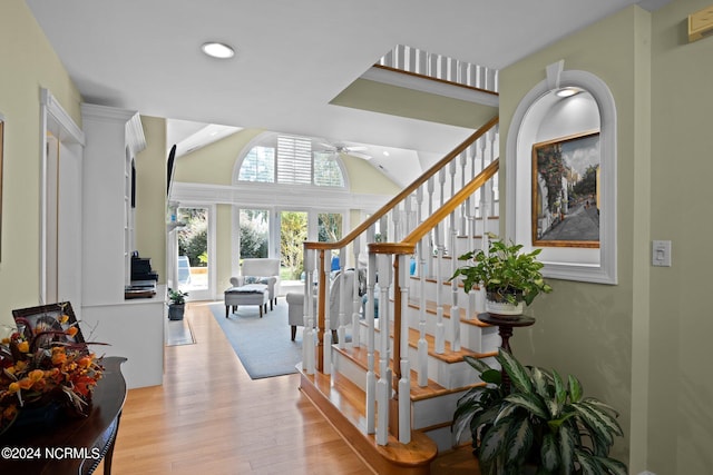 interior space with wood-type flooring and ceiling fan