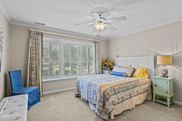 bedroom with ceiling fan, crown molding, and multiple windows