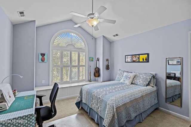 carpeted bedroom featuring vaulted ceiling and ceiling fan