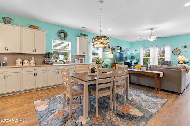 dining area featuring ceiling fan, light wood-style flooring, and recessed lighting